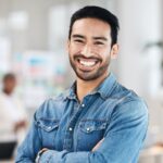 portrait-business-and-man-with-arms-crossed-smil-2023-11-27-05-08-18-utc.jpg